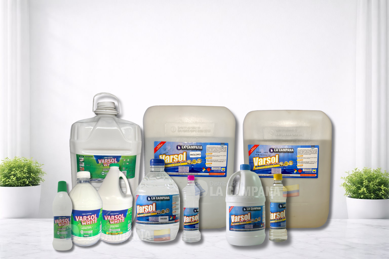 Assorted automotive fluids and cleaners in plastic bottles and jugs on a white surface