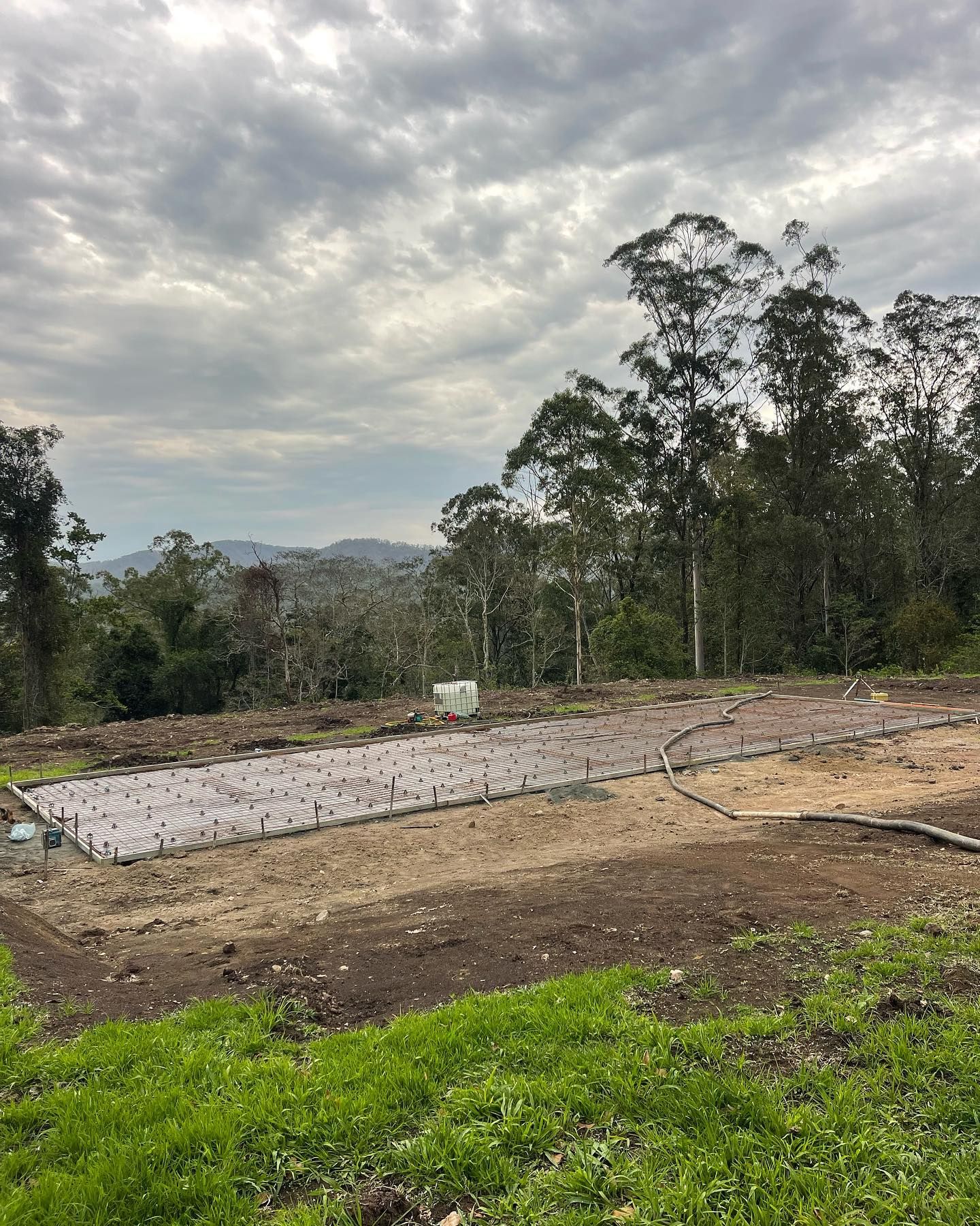 Field with Trees and Mountains in the Background — Casino, NSW — Lismore Concrete Pumping