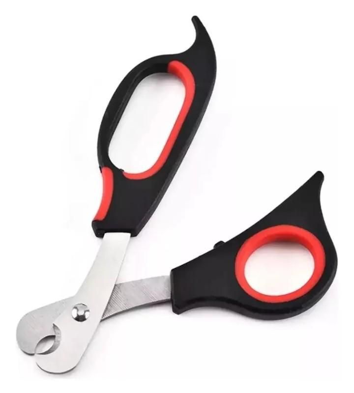 Cortaúñas para mascotas con mangos de color rojo y negro, abierto sobre fondo blanco.
