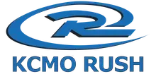 Blue logo of KCMO Rush, a sports organization. A stylized