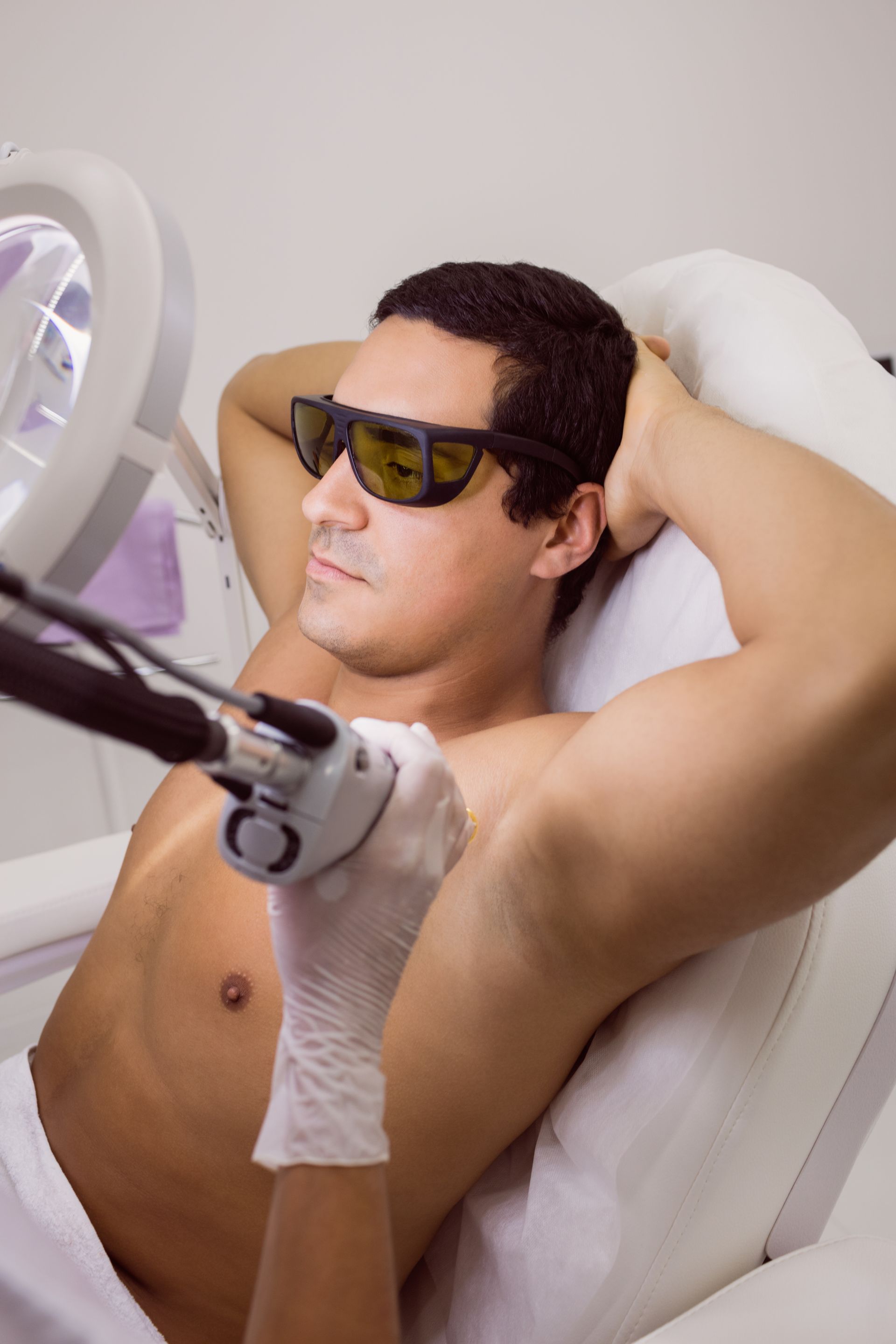 man getting laser hair removal