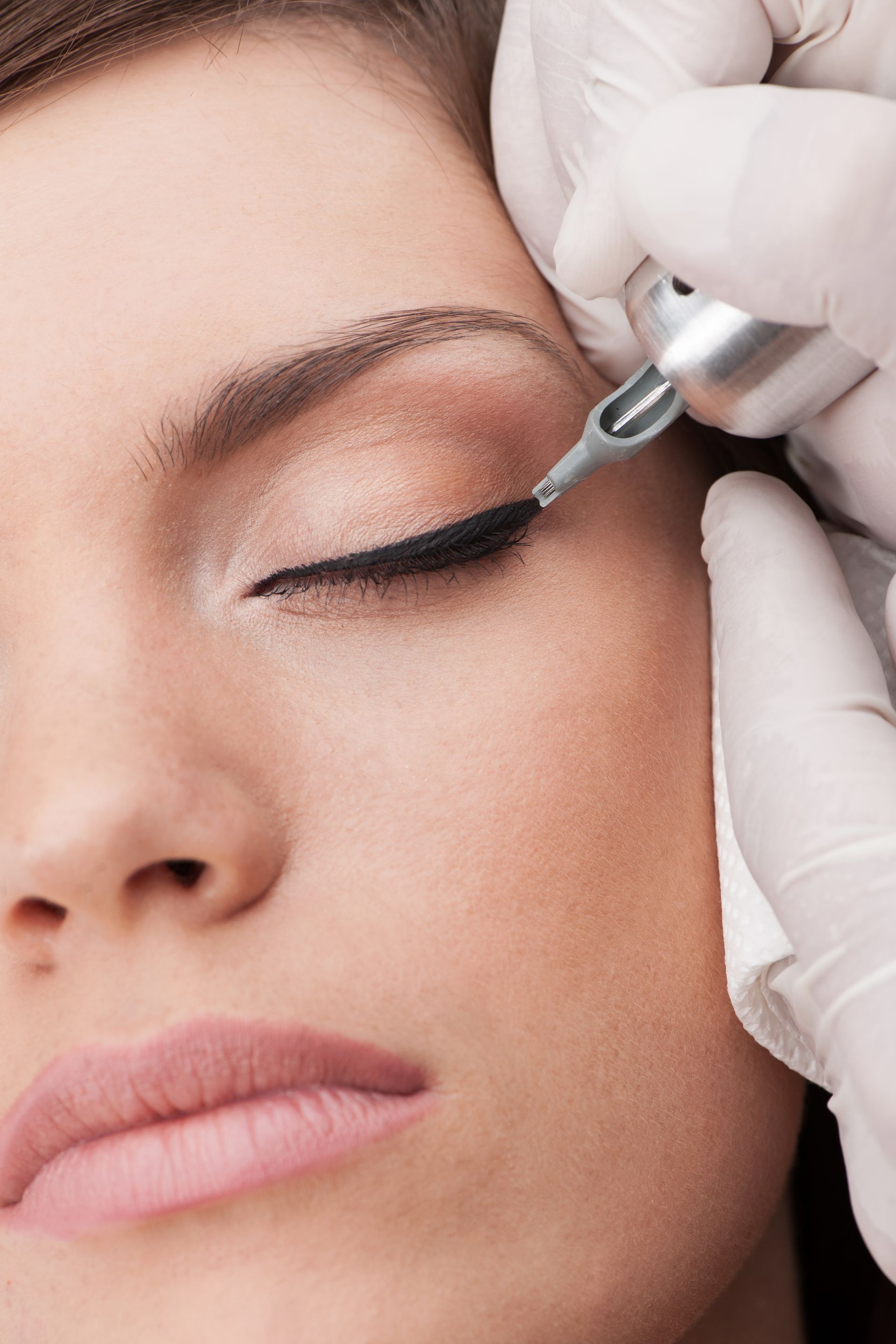 woman getting permanent eyeliner