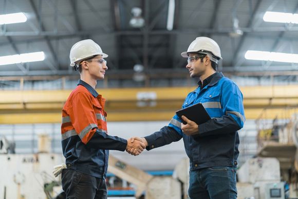 Hand Shake Greeting Of Professional Engineer Teamwork In Factory - San Antonio, TX - Canopy Employment Screening Hand Shake Greeting Of Professional Engineer Teamwork In Factory - San Antonio, TX - Canopy Employment Screening