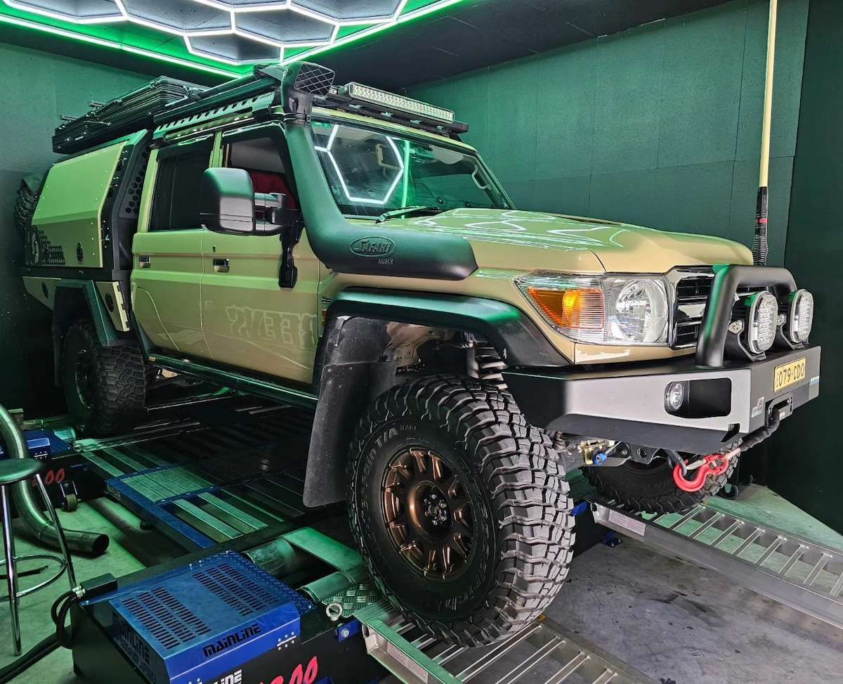 Tan Off-road Vehicle With a Roof Rack and Spotlights — Greens Diesel Tune in Campbelltown, NSW