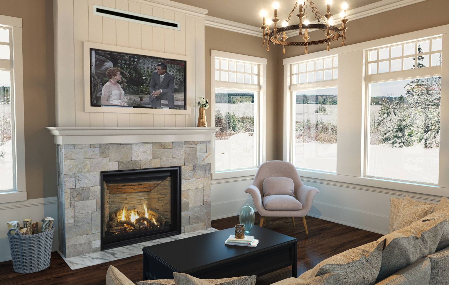 Cozy living room with stone fireplace, TV, and large windows overlooking a snowy landscape. A pink armchair and gray sofa provide seating.