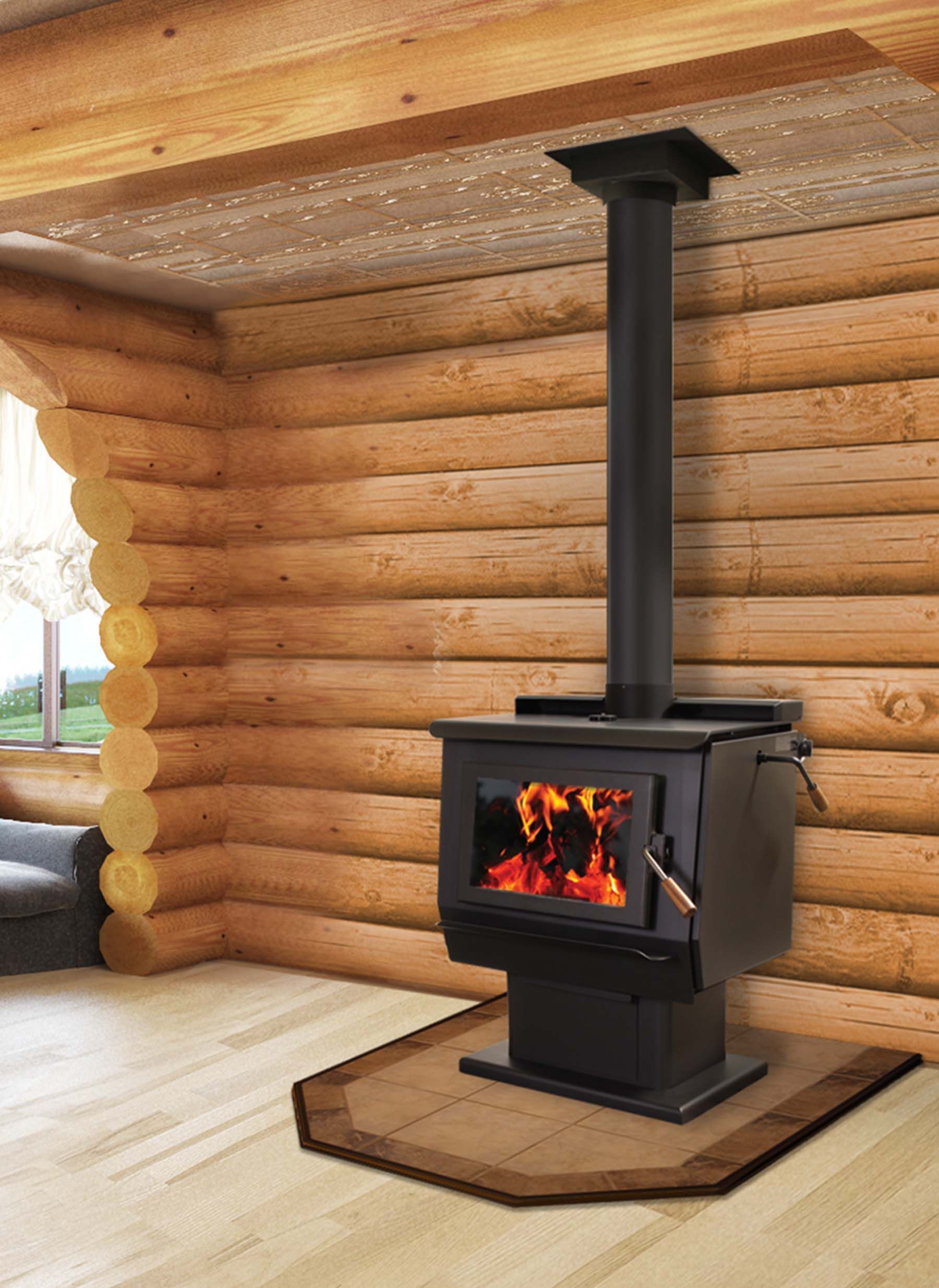 Black wood-burning stove in a log cabin, with flames visible through the glass door. The stove sits on a brown mat.