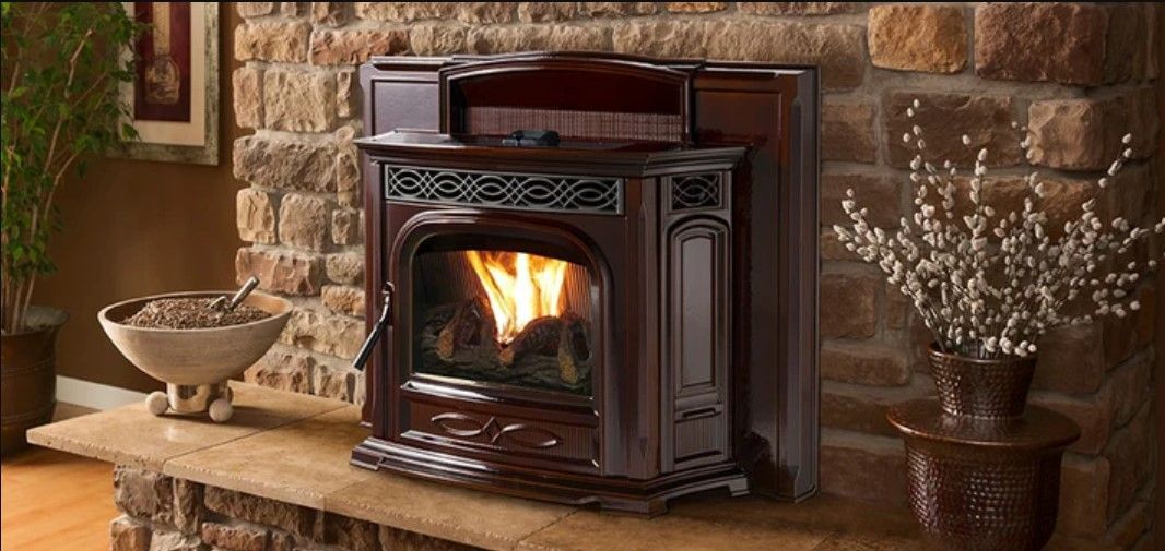 Fireplace with flames burning in a brick wall, with decorative mantle and objects.
