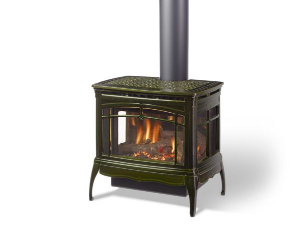 Green gas fireplace with flames visible through glass panels, black chimney, and light background.