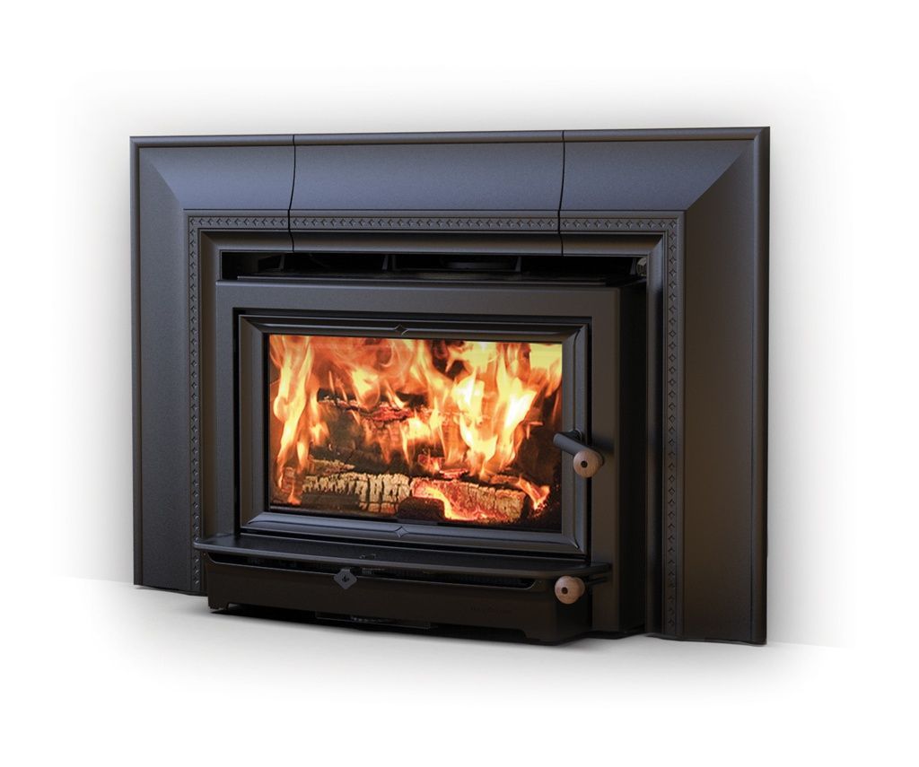 A black fireplace with a roaring fire inside, viewed at an angle.