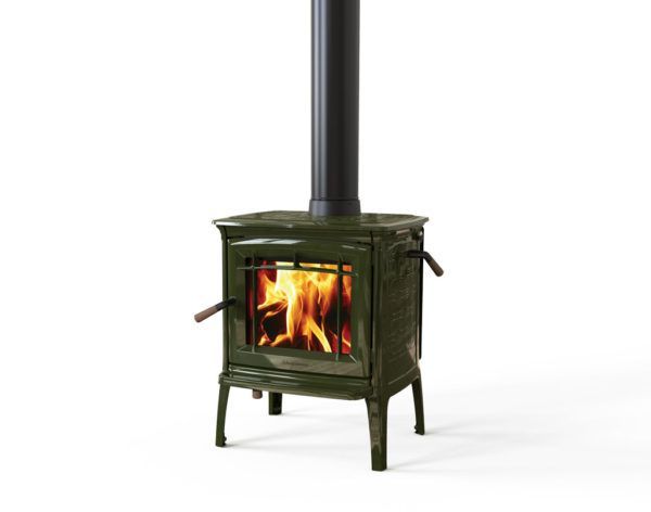 Green cast iron wood-burning stove with lit flames inside, black chimney, set against a white background.
