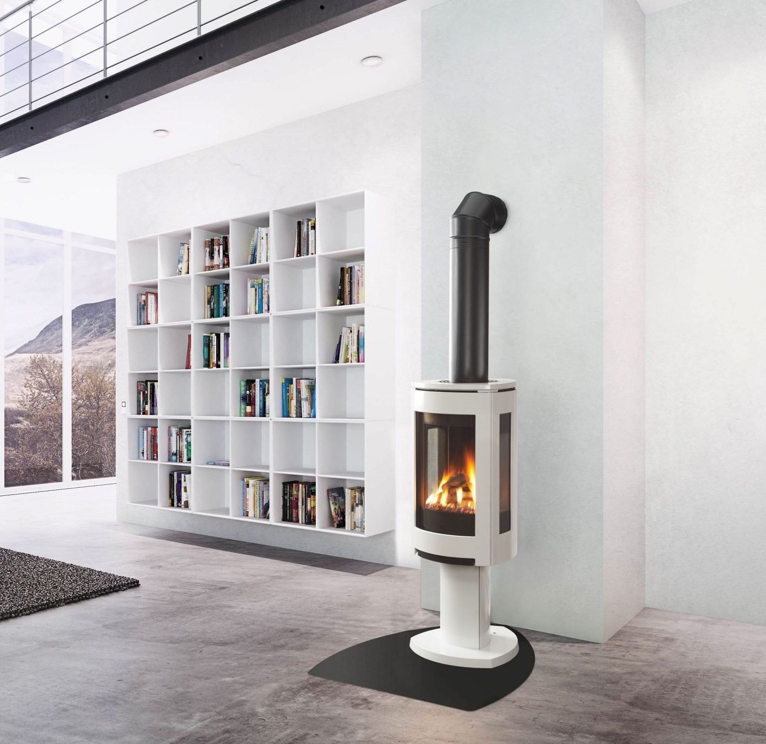 Modern white fireplace with black chimney in a minimalist white room, next to a built-in bookshelf.