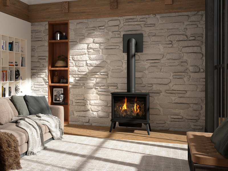 Cozy living room with a stone wall and a lit fireplace. A sofa, bookshelf, and wooden beams are also visible.