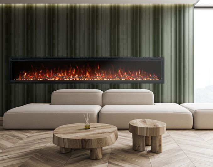 Modern living room with a large fireplace, beige sofa, and wooden coffee tables against a dark green textured wall.