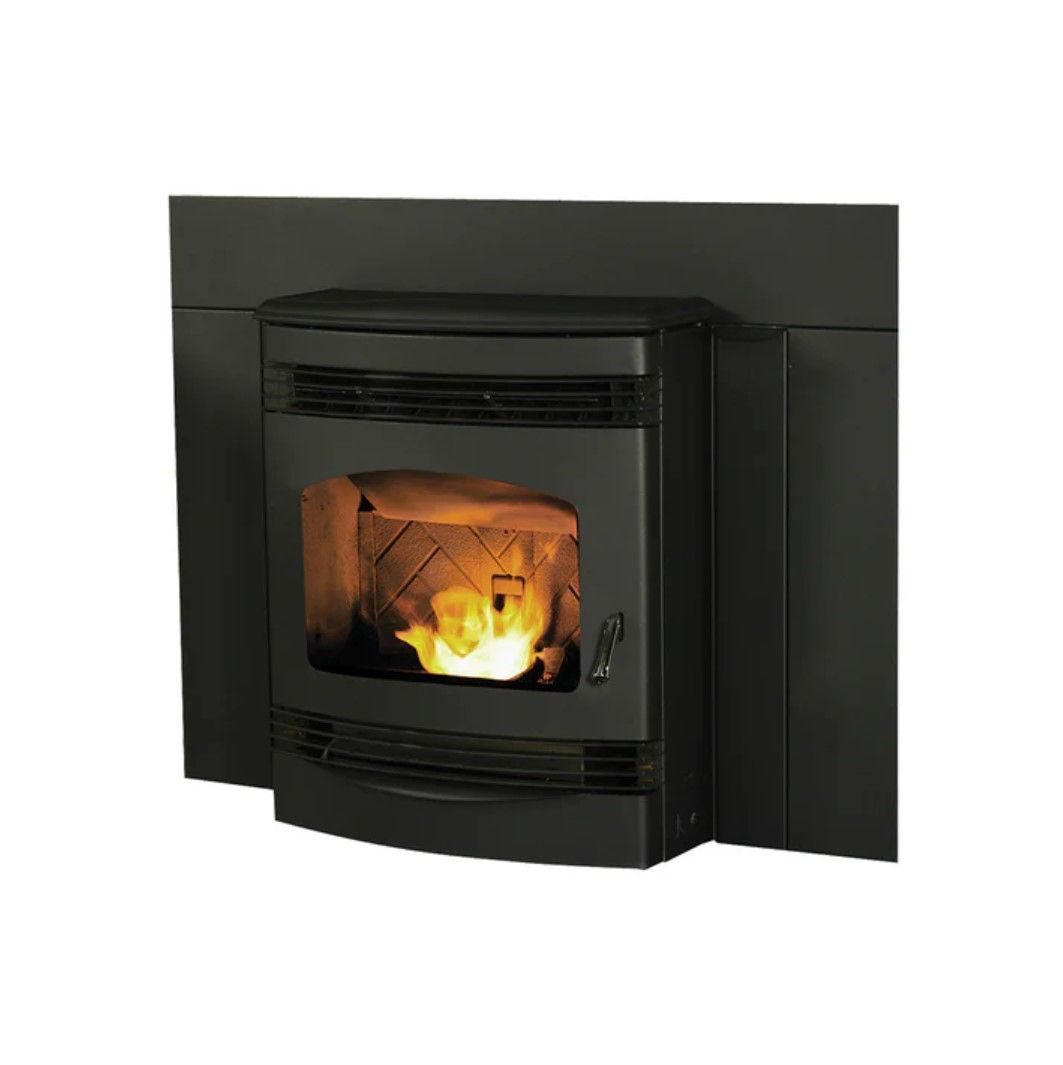 A black, wall-mounted pellet stove with a glowing fire visible through the glass door.