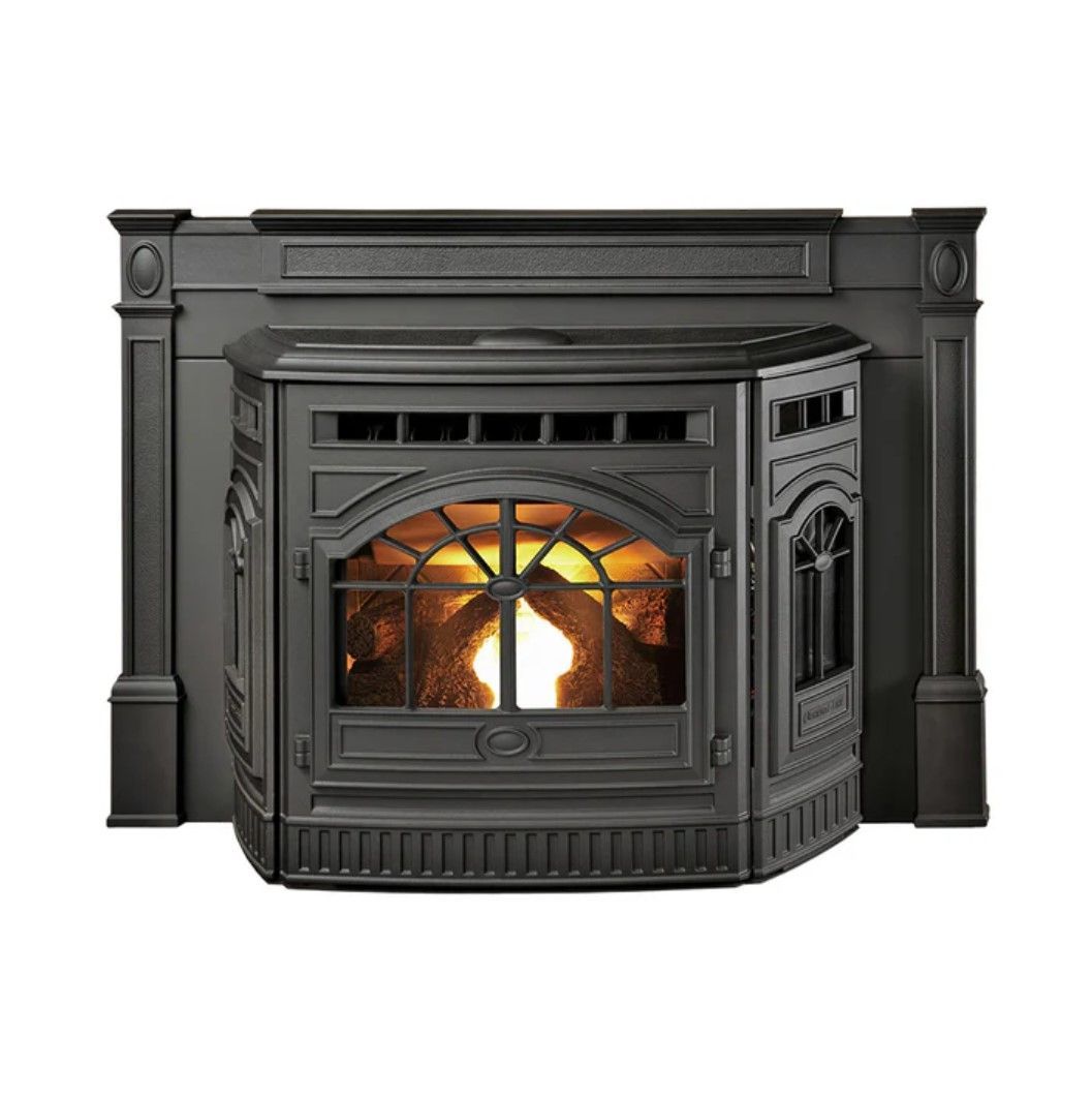 Black cast iron pellet stove with an arched front window and flames visible inside. Decorative panels frame the stove.