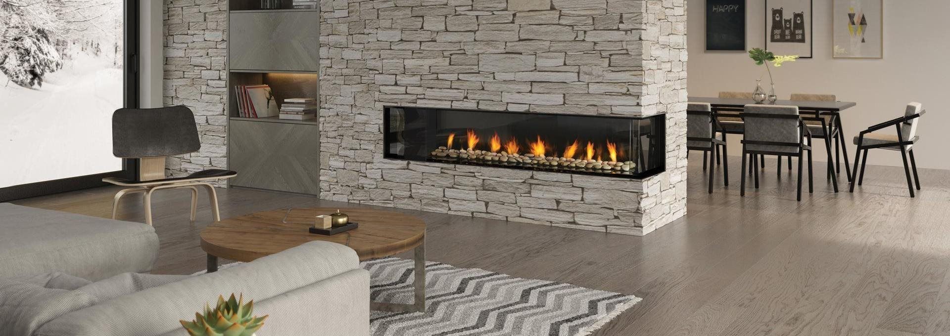 A modern living room features a fireplace, dining area, and a window overlooking a snowy landscape. The space has a neutral color palette.