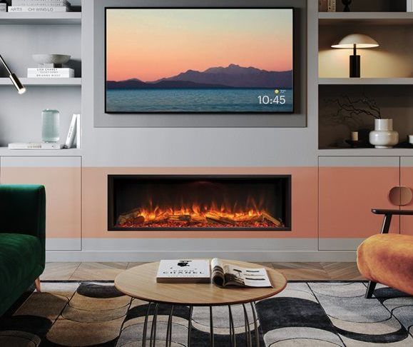 A modern living room with a built-in electric fireplace, a mounted TV, and contemporary furniture in shades of orange, gray, and green.