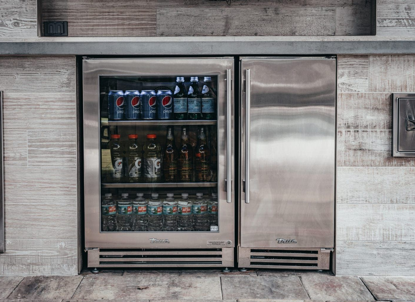 An outdoor refrigerator and ice maker from True