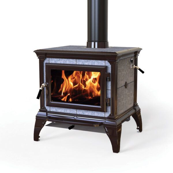 A dark brown wood-burning stove with a roaring fire visible through the glass door, with a black chimney pipe.