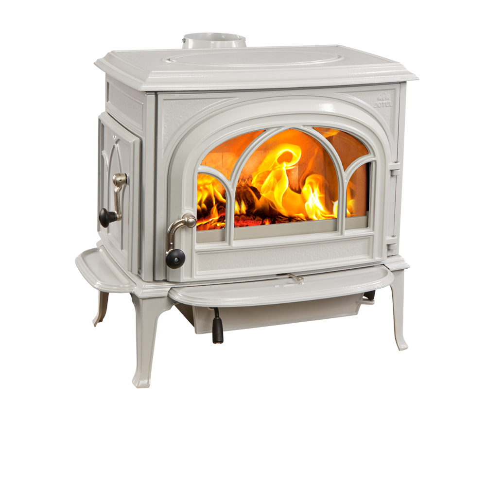 A gray wood-burning stove with an arched glass door displaying a burning fire, set in a room.