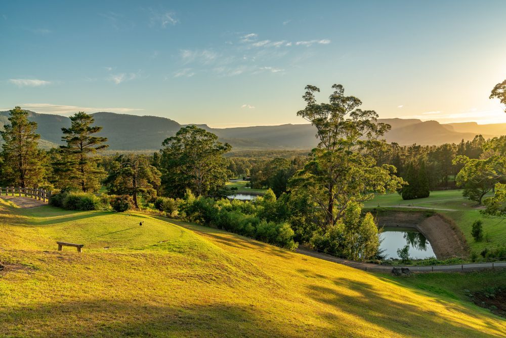 A View Of Mountains In The Background At Sunset — Ridgeline Building Co In Kangaroo Valley, NSW
