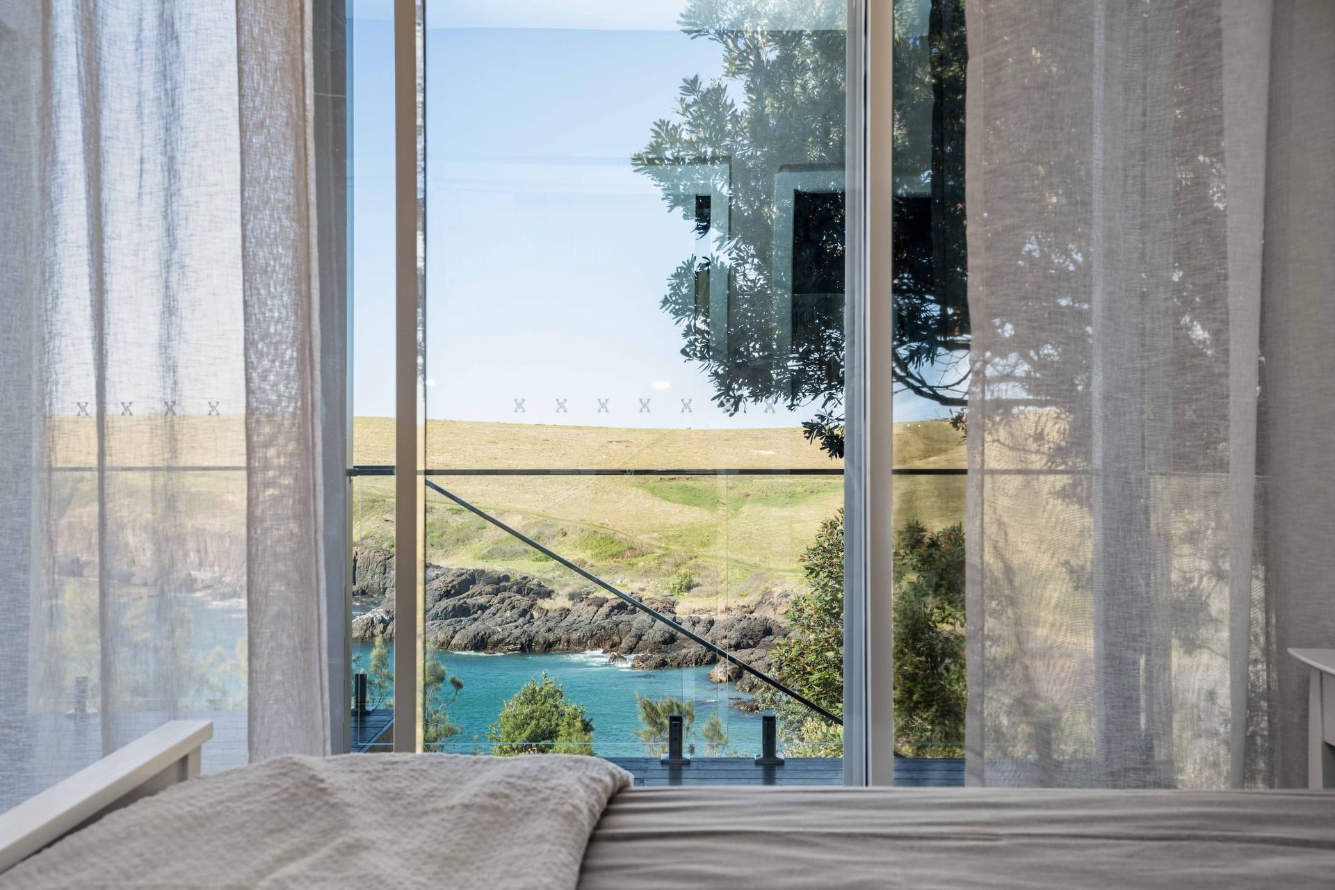 View From A Bedroom Overlooking A Coastline — Ridgeline Building Co In Nowra, NSW