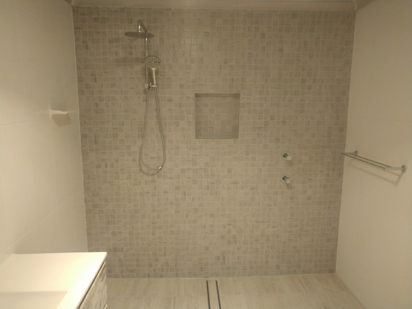 A Bathroom With a Bathtub and a Walk in Shower — Bob Ryan's Home Improvements & Construction Pty Ltd in Beecher, QLD