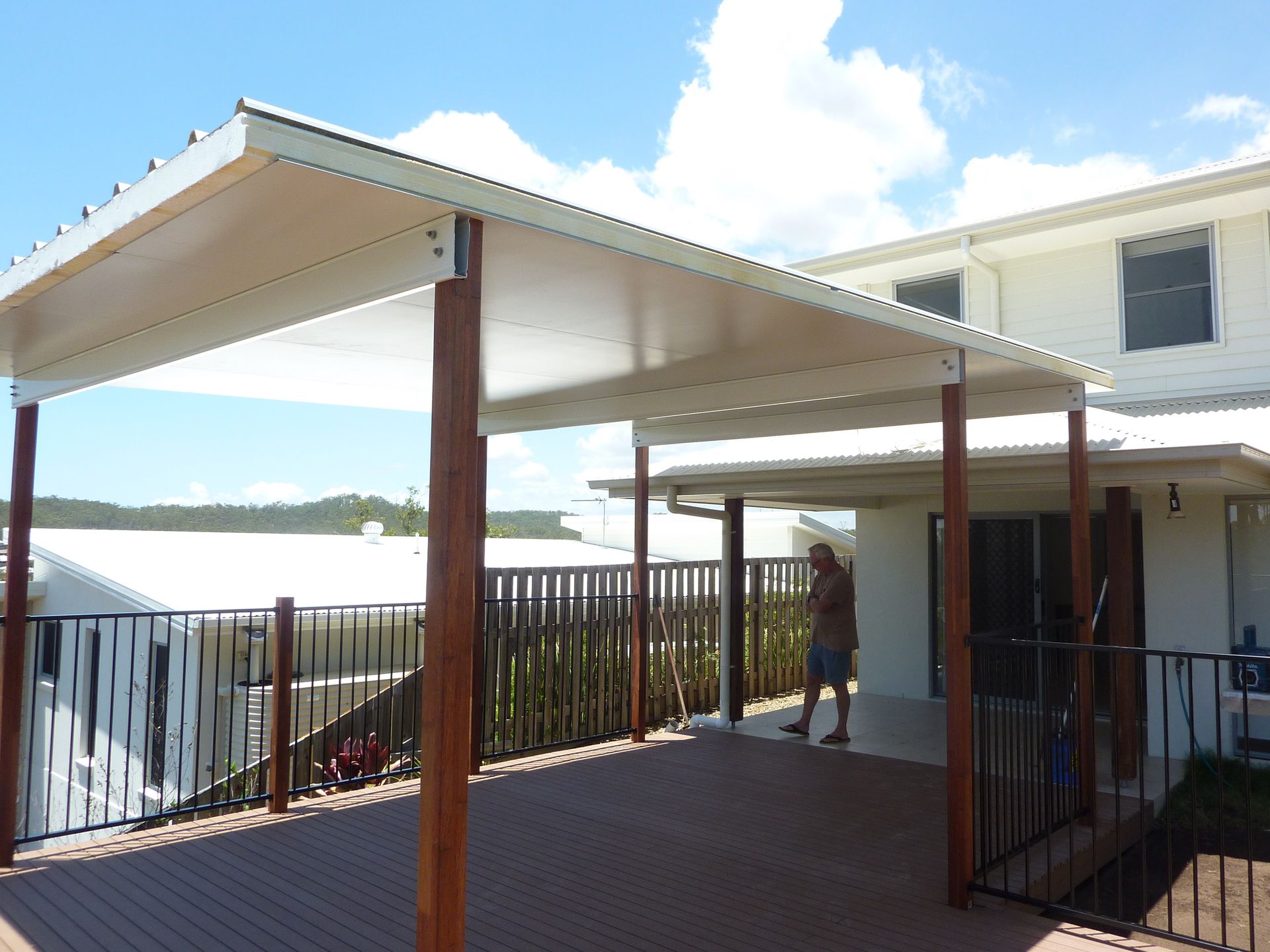 A Before and After Picture of a Room Being Painted — Bob Ryan's Home Improvements & Construction Pty Ltd in Beecher, QLD