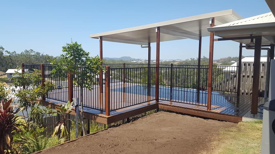 There is a Large Deck With a Fence Around It — Bob Ryan's Home Improvements & Construction Pty Ltd in Beecher, QLD