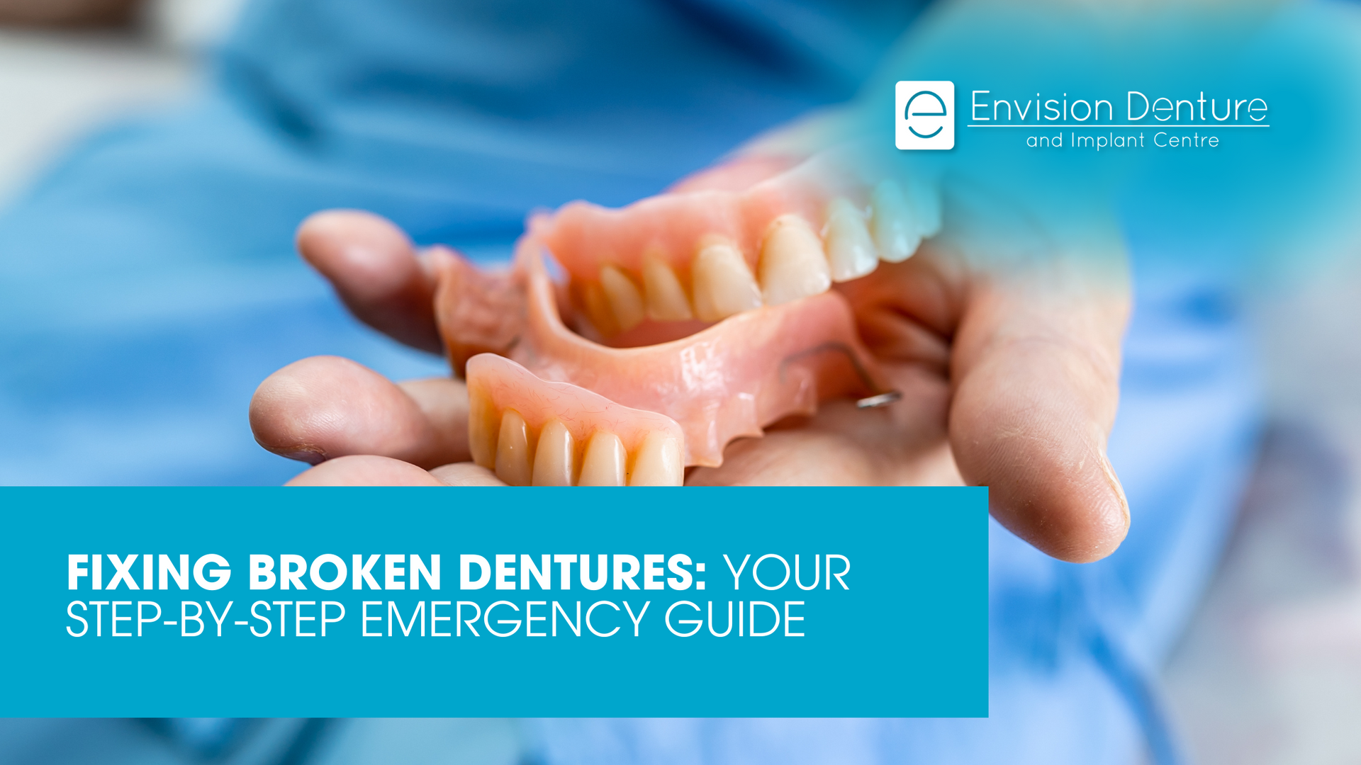 A person is holding a pair of dentures in their hands.