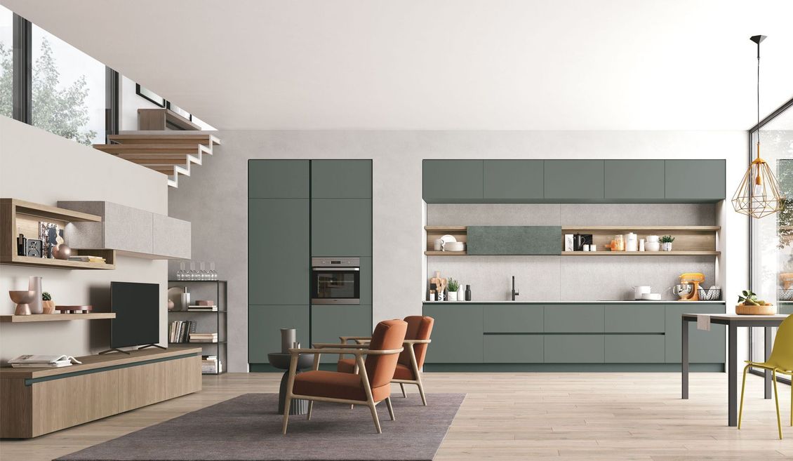Un soggiorno con cucina e zona pranzo