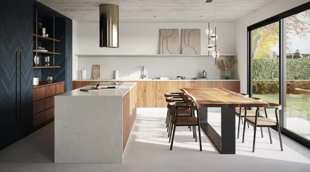 Modern kitchen with wood accents, an island, dining table, and large window.
