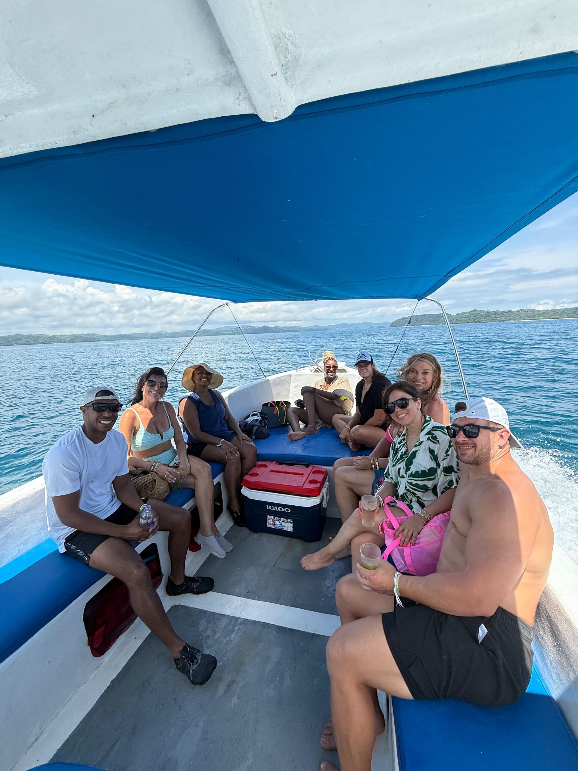 Guests enjoying a private boat tour in Guanacaste Costa Rica while cruising the Pacific coast near the Gulf of Papagayo