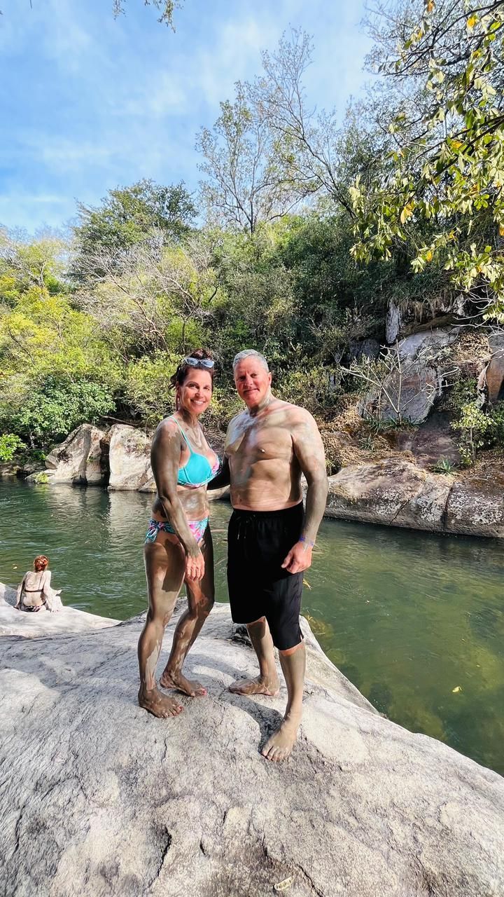Travelers enjoying a natural pool during a Mega Combo adventure excursion in Guanacaste Costa Rica