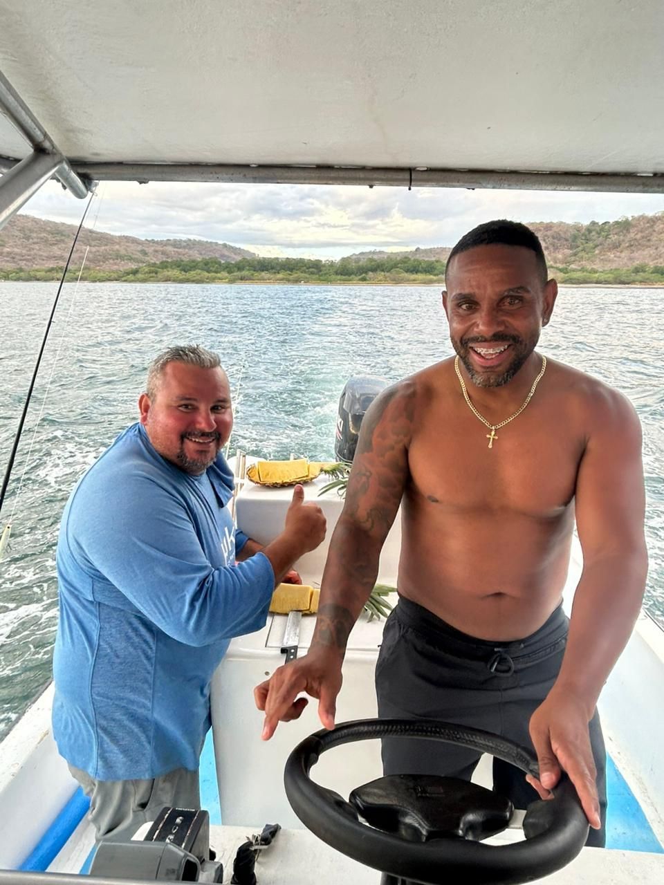 Guests enjoying a private boat excursion in Guanacaste Costa Rica surrounded by tropical Pacific coast scenery