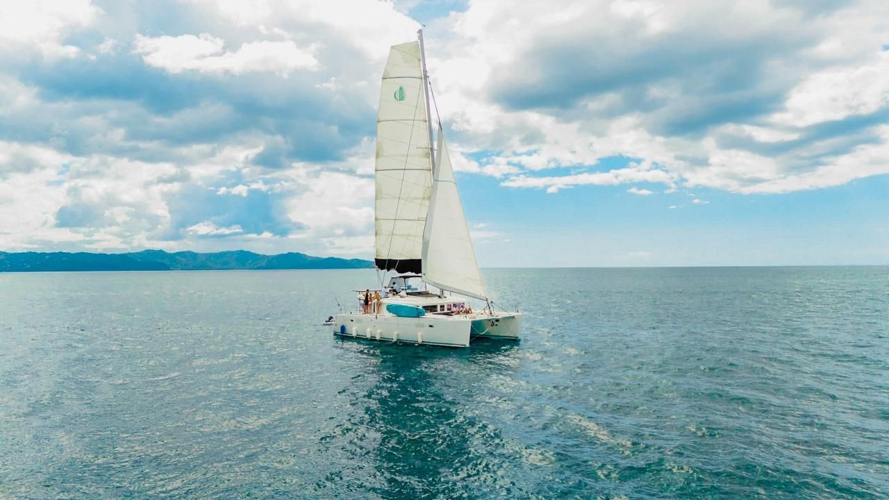 Private catamaran excursion from Nekajui, a Ritz-Carlton Reserve, exploring the Pacific coast of Guanacaste, Costa Rica.