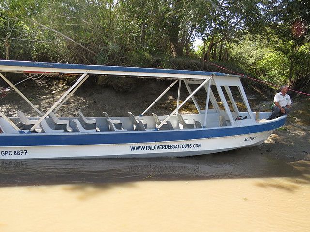 Private Safari Boat cruising the Tempisque River for wildlife viewing in Costa Rica.