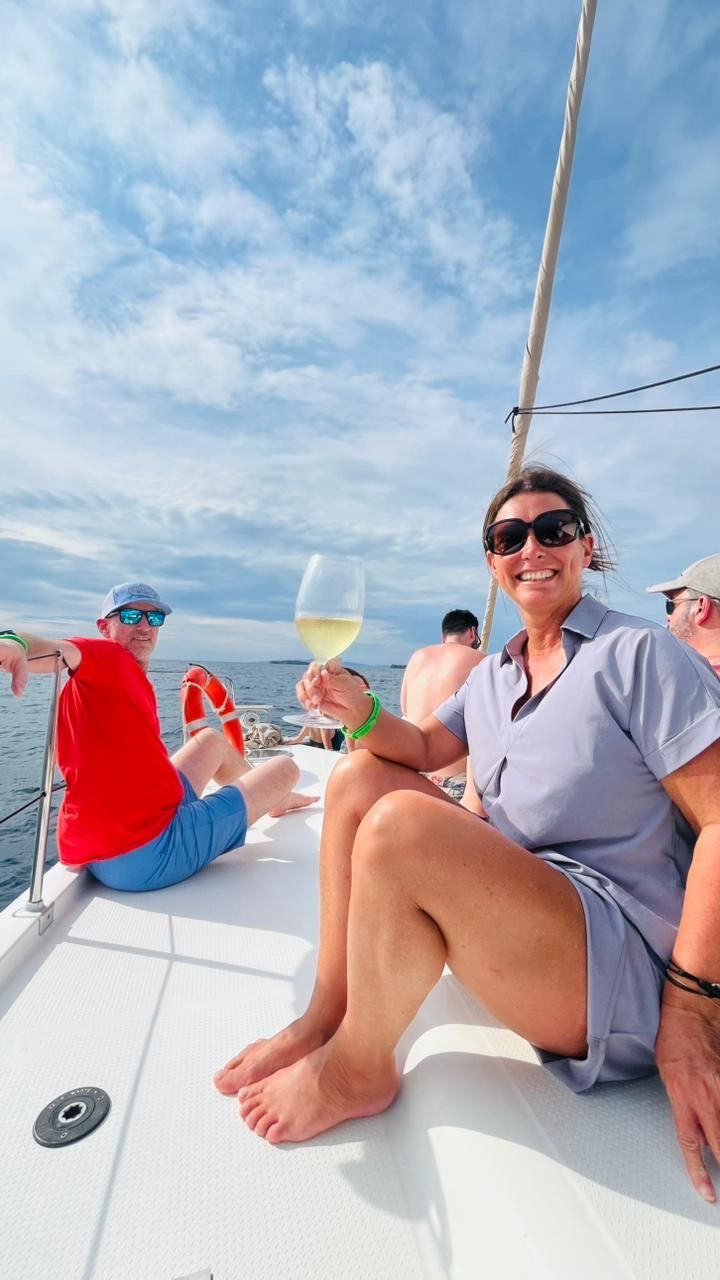 Guest relaxing during a Private Catamaran Tour in Guanacaste, Costa Rica with Tropic Transfers & Tours CR.