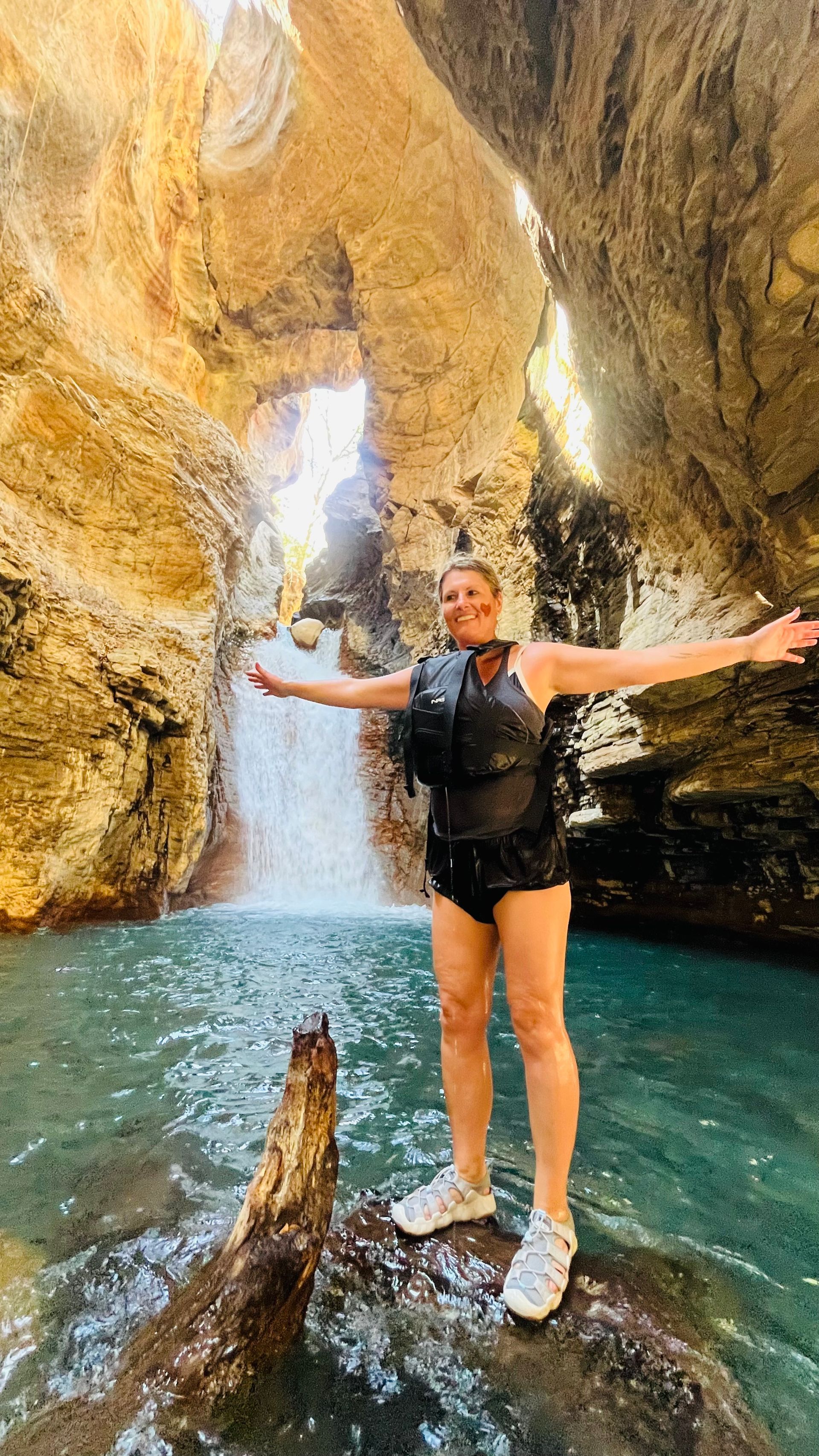 La Leona Waterfall inside a volcanic canyon with turquoise water near Curubandé, Guanacaste, Costa Rica