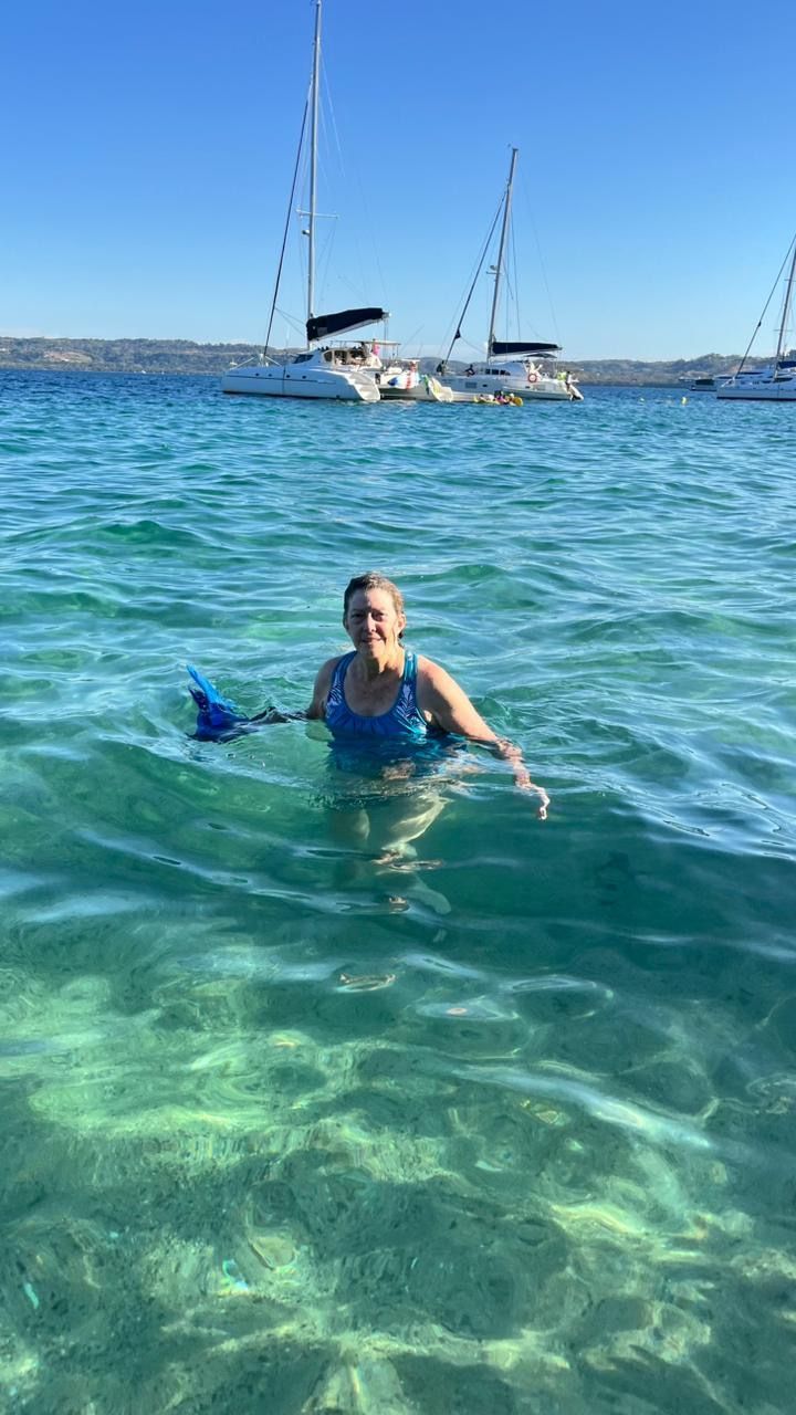 Guest snorkeling in clear Pacific waters during a private boat tour along the Guanacaste coast of Costa Rica