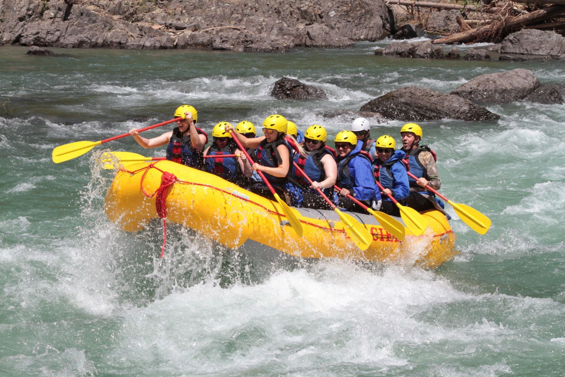 Rafters navigating exciting white water rapids during an action-packed Costa Rica rafting adventure.