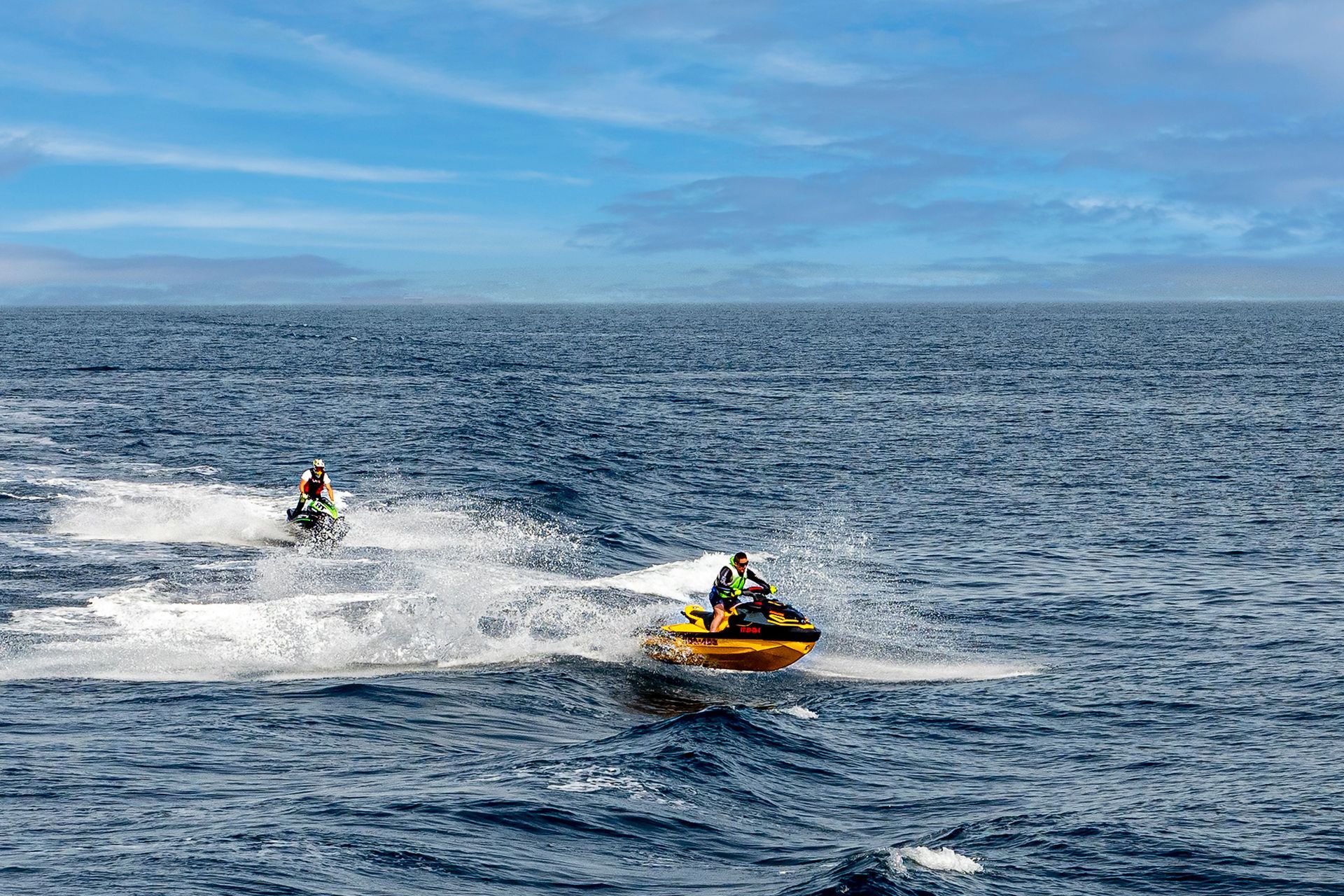 Jet ski excursion in Guanacaste Costa Rica with rider exploring open Pacific waters and scenic tropical coastline.