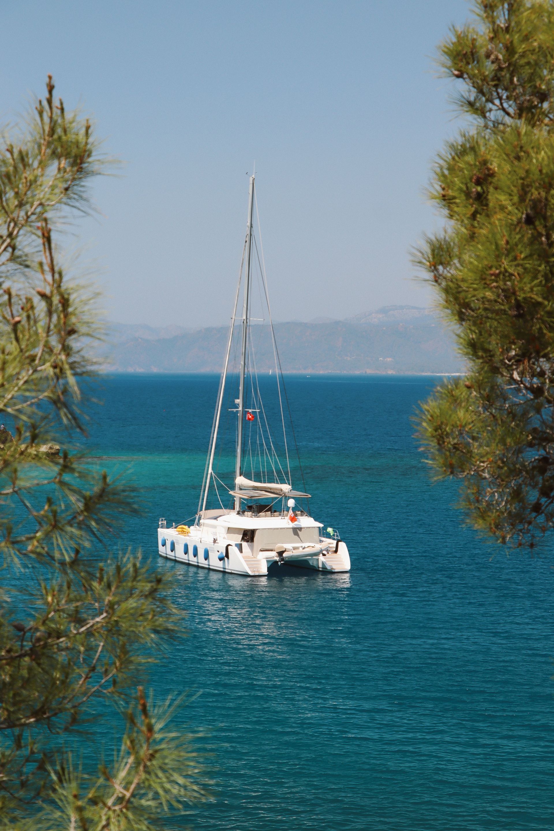 Catamaran sailing along the Pacific coast during an ocean excursion from Tamarindo Costa Rica.