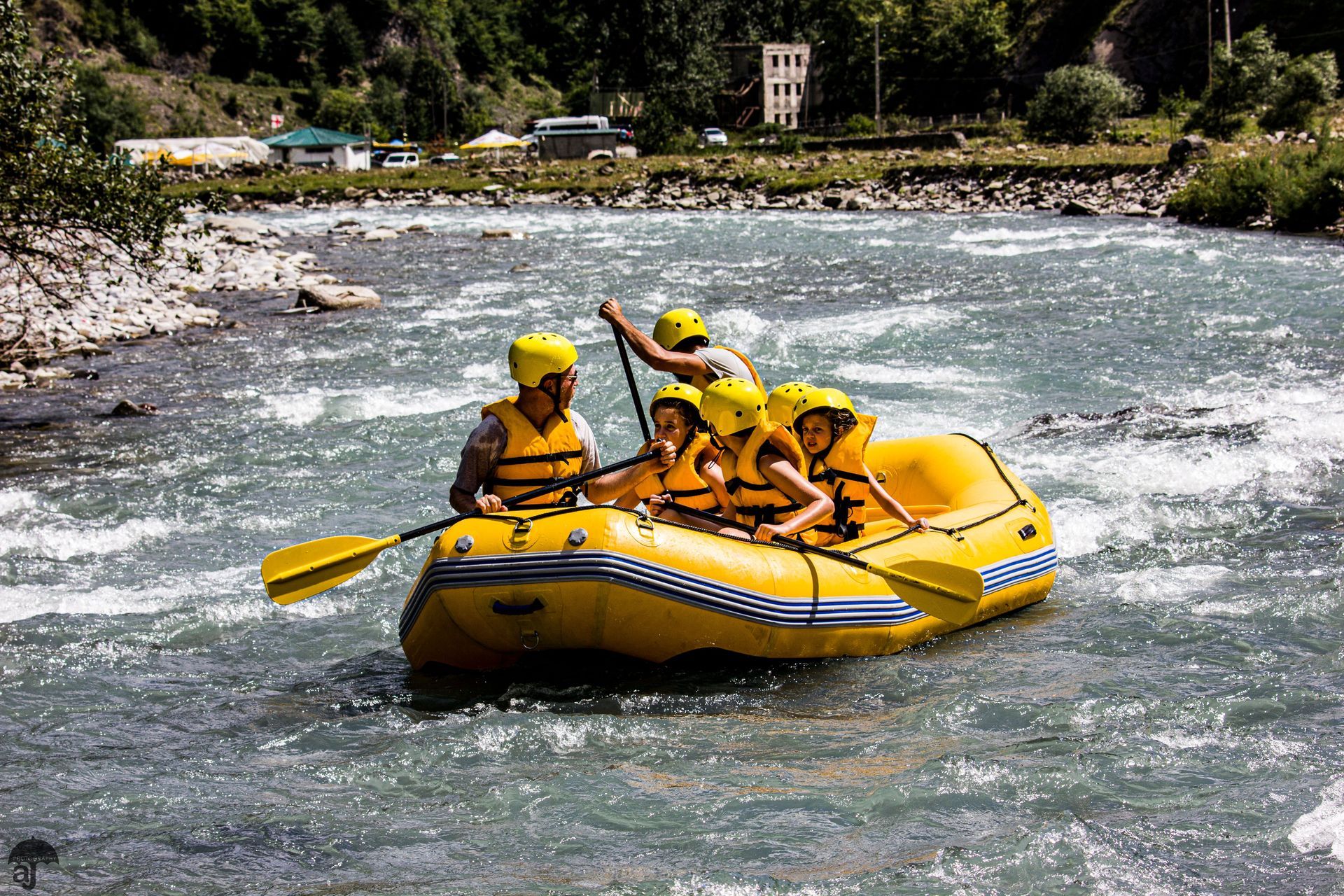 Travelers enjoying a guided white water rafting experience combining outdoor adventure and natural scenery in Costa Rica