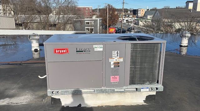 Technician Servicing Heating Boiler - Heating Services in Jericho, VT