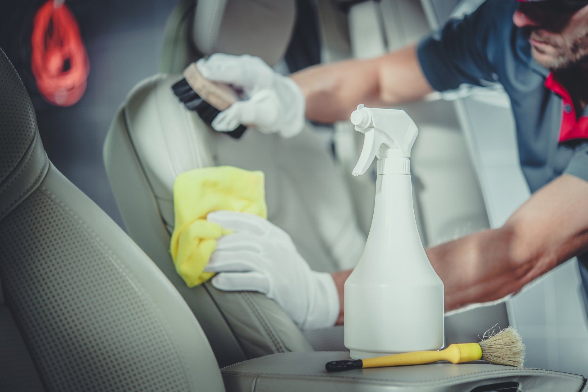 technician cleaning a clients car in Arizona