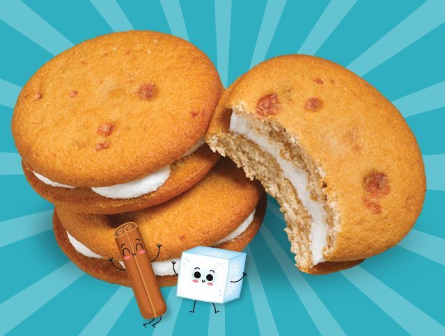 A stack of cookies with a marshmallow and a hot dog