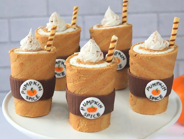 pumpkin spice rolls decorated to look like pumpkin spice lattes