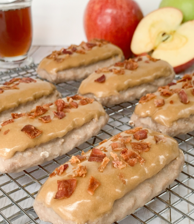 apple cinnamon donut sticks topped with ample icing and turkey bacon