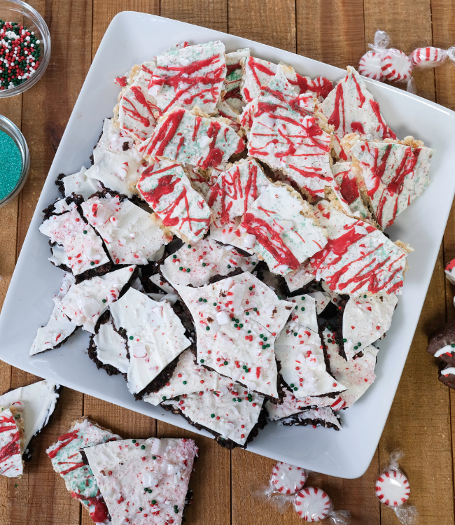 plate of christmas tree cake bark on a white plate